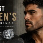 Best men’s earrings featuring silver round-cut stud earrings styled on a male model in a modern masculine jewelry editorial.